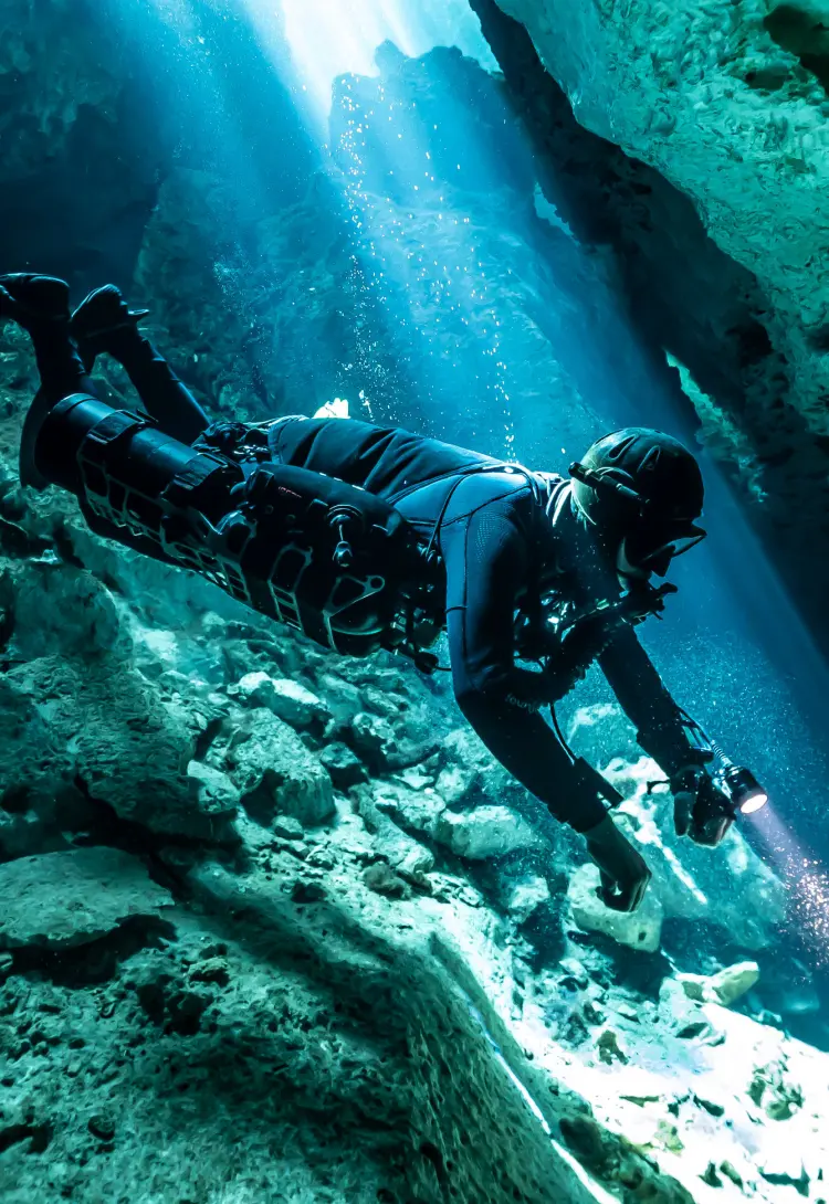 Diver in a cave on CCR Liberty