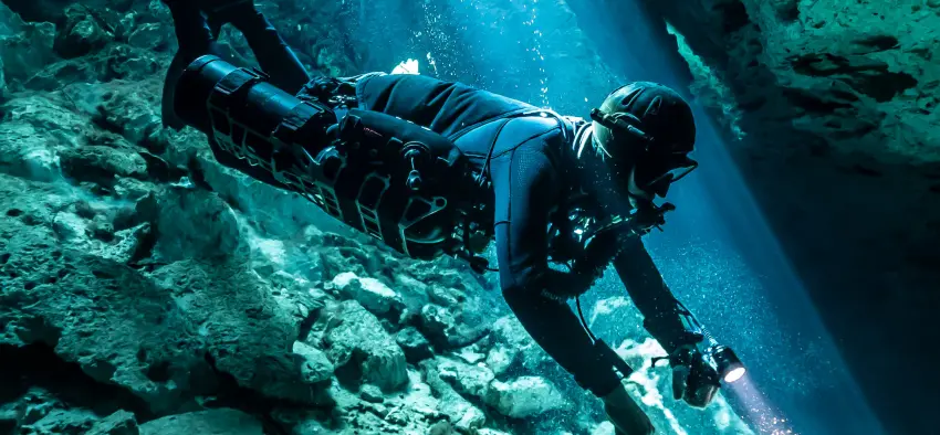 Diver in a cave on CCR Liberty